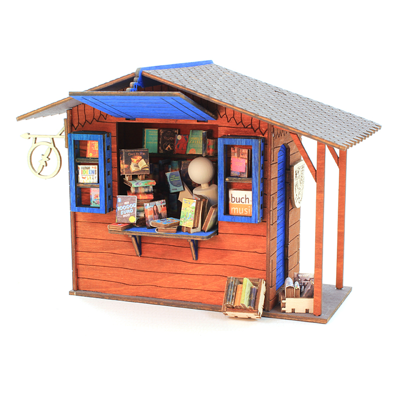 Modellhaus Marktbude für die Bücherfreunde, farbig mit Figur und Ware